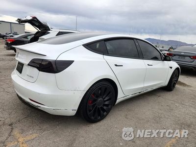 Trzecie zdjęcie samochodu z tyłu: 2022 TESLA MODEL 3 VIN:5YJ3E1EC6NF339734 - miniatura
