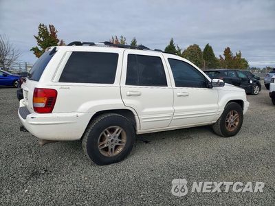 Trzecie zdjęcie samochodu z tyłu: 1999 JEEP GRAND CHEROKEE VIN:1J4GW68N6XC638966 - miniatura