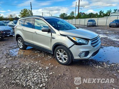 Czwarte zdjęcie samochodu z boku: 2017 FORD ESCAPE SE VIN:1FMCU9G90HUD32742 - miniatura