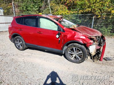Czwarte zdjęcie samochodu z boku: 2016 TOYOTA RAV4 XLE VIN:JTMRFREV9GJ061088 - miniatura