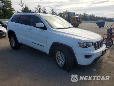 Czwarte zdjęcie samochodu z boku: 2019 JEEP GRAND CHEROKEE LAREDO VIN:1C4RJFAG0KC853731 - miniatura
