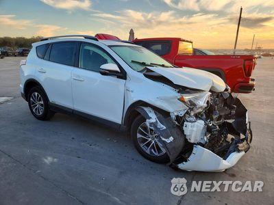 Czwarte zdjęcie samochodu z boku: 2017 TOYOTA RAV4 HYBRID XLE VIN:JTMRJREV8HD059783 - miniatura