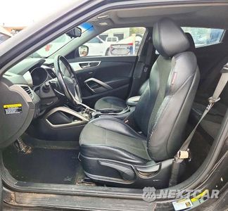 Zdjęcie 7 z 12 samochodu: 2013 HYUNDAI VELOSTER BASE VIN:KMHTC6AD7DU175400 - miniatura