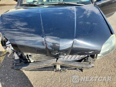 Zdjęcie 11 z 13 samochodu: 2004 MITSUBISHI GALANT GTS VIN:4A3AB76S04E138644 - miniatura