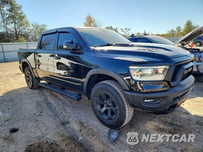 Czwarte zdjęcie samochodu z boku: 2021 RAM 1500 REBEL VIN:1C6RRELG7MN656716 - miniatura