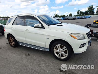 Czwarte zdjęcie samochodu z boku: 2012 MERCEDES-BENZ ML 350 4MATIC VIN:4JGDA5HB9CA036510 - miniatura