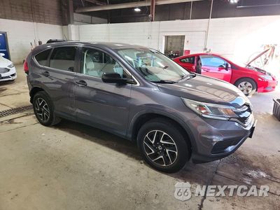 Czwarte zdjęcie samochodu z boku: 2016 HONDA CR-V SE VIN:5J6RM4H49GL078094 - miniatura