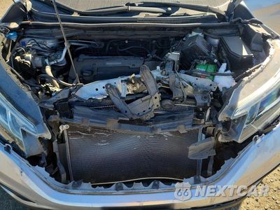 Zdjęcie 12 z 13 samochodu: 2016 HONDA CR-V LX VIN:2HKRM3H35GH502785 - miniatura