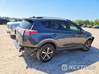 Trzecie zdjęcie samochodu z tyłu: 2018 TOYOTA RAV4 XLE VIN:JTMWFREV9JJ186151 - miniatura
