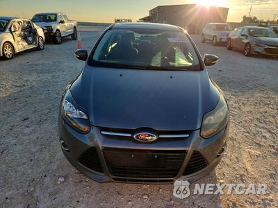 Piąte zdjęcie samochodu w środku: 2014 FORD FOCUS TITANIUM VIN:1FADP3N22EL381001 - miniatura