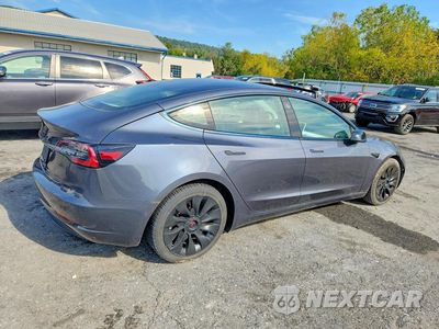 Trzecie zdjęcie samochodu z tyłu: 2021 TESLA MODEL 3 VIN:5YJ3E1EA1MF026815 - miniatura