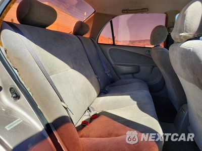 Zdjęcie 10 z 12 samochodu: 2002 TOYOTA COROLLA CE VIN:1NXBR12E42Z602484 - miniatura