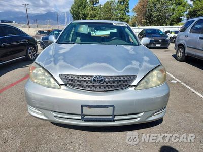 Piąte zdjęcie samochodu w środku: 2003 TOYOTA CAMRY LE VIN:JTDBE32K430153690 - miniatura