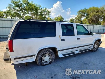 Trzecie zdjęcie samochodu z tyłu: 2001 CHEVROLET SUBURBAN C1500 VIN:1GNEC16R1TJ332219 - miniatura