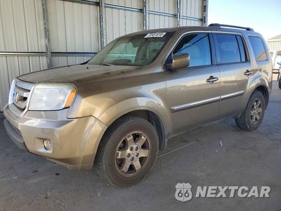 2011 HONDA PILOT TOURING 5FNYF3H94BB021184 - główne zdjęcie licytacji z USA - miniatura
