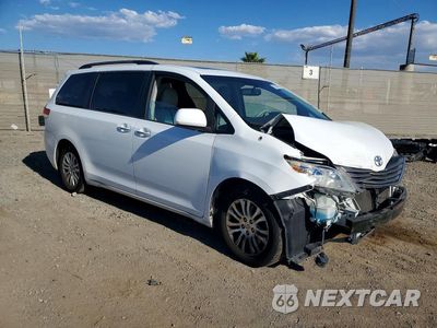 Czwarte zdjęcie samochodu z boku: 2014 TOYOTA SIENNA XLE 8-PASSENGER VIN:5TDYK3DC1ES474174 - miniatura