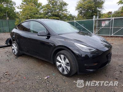 Czwarte zdjęcie samochodu z boku: 2024 TESLA MODEL Y VIN:7SAYGAEE1RF089426 - miniatura