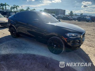 Czwarte zdjęcie samochodu z boku: 2019 BMW X6 SDRIVE35I VIN:5UXKU0C59K0H98880 - miniatura