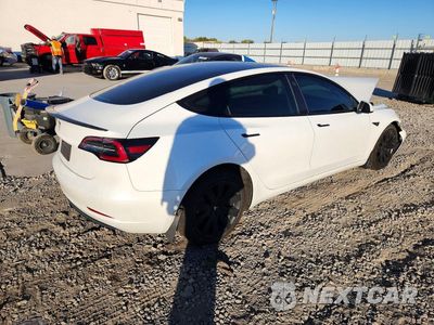 Trzecie zdjęcie samochodu z tyłu: 2021 TESLA MODEL 3 VIN:5YJ3E1EA3MF048654 - miniatura