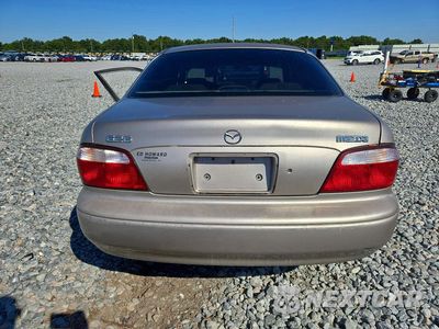 Zdjęcie 6 z 12 samochodu: 2002 MAZDA 626 LX VIN:1YVGF22C025302565 - miniatura