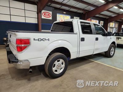 Trzecie zdjęcie samochodu z tyłu: 2014 FORD F150 SUPERCREW VIN:1FTFW1EF7EFB40482 - miniatura
