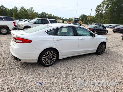 Trzecie zdjęcie samochodu z tyłu: 2017 FORD FUSION TITANIUM VIN:3FA6P0K94HR115087 - miniatura