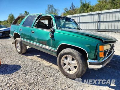 Czwarte zdjęcie samochodu z boku: 1999 GMC YUKON VIN:1GKEK13R4XJ736075 - miniatura