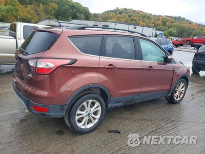 Trzecie zdjęcie samochodu z tyłu: 2018 FORD ESCAPE SE VIN:1FMCU9GD0JUC25989 - miniatura