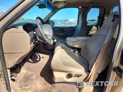 Zdjęcie 7 z 12 samochodu: 2000 FORD F150 VIN:1FTRX17WXYKA58099 - miniatura