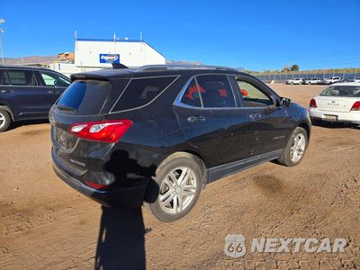 Trzecie zdjęcie samochodu z tyłu: 2018 CHEVROLET EQUINOX PREMIER VIN:2GNAXVEV0J6118504 - miniatura