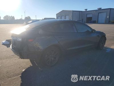 Trzecie zdjęcie samochodu z tyłu: 2023 TESLA MODEL 3 VIN:5YJ3E1EA5PF497449 - miniatura