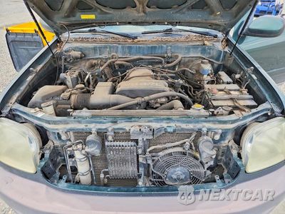 Zdjęcie 12 z 13 samochodu: 2002 TOYOTA SEQUOIA SR5 VIN:5TDBT44A72S074297 - miniatura