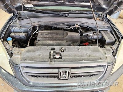 Zdjęcie 12 z 13 samochodu: 2004 HONDA PILOT EXL VIN:5FNYF18574B010247 - miniatura
