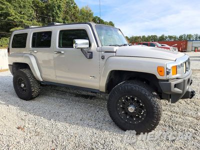 Czwarte zdjęcie samochodu z boku: 2006 HUMMER H3 VIN:5GTDN136268259150 - miniatura