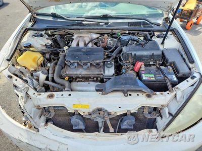 Zdjęcie 11 z 12 samochodu: 2002 TOYOTA CAMRY LE V6 VIN:JTDBF32KX20021612 - miniatura