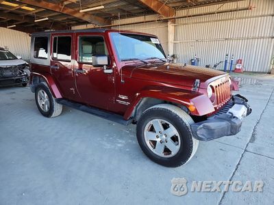 Czwarte zdjęcie samochodu z boku: 2008 JEEP WRANGLER UNLIMITED SAHARA VIN:1J4GA59188L531438 - miniatura