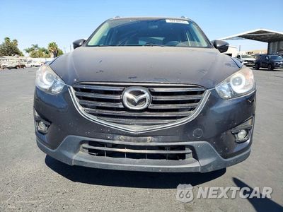 Piąte zdjęcie samochodu w środku: 2016 MAZDA CX-5 GT VIN:JM3KE4DY2G0838808 - miniatura