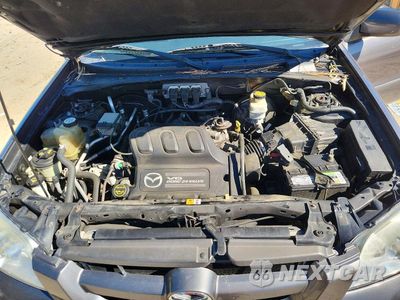 Zdjęcie 12 z 13 samochodu: 2005 MAZDA TRIBUTE S VIN:4F2CZ96115KM16772 - miniatura
