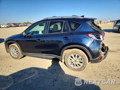 Drugie zdjęcie samochodu z przodu: 2016 MAZDA CX-5 TOURING VIN:JM3KE2CY0G0736686 - miniatura
