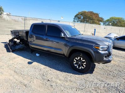 Czwarte zdjęcie samochodu z boku: 2023 TOYOTA TACOMA TRD OFF-ROAD VIN:3TMDZ5BN3PM163519 - miniatura