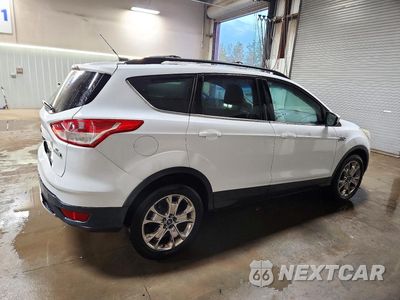 Trzecie zdjęcie samochodu z tyłu: 2014 FORD ESCAPE SE VIN:1FMCU0G92EUC35307 - miniatura