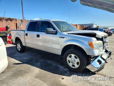 Czwarte zdjęcie samochodu z boku: 2014 FORD F150 SUPERCREW VIN:1FTFW1EFXEKE65554 - miniatura