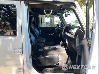 Piąte zdjęcie samochodu w środku: 2015 JEEP WRANGLER UNLIMITED RUBICON VIN:1C4BJWFG3FL530855 - miniatura