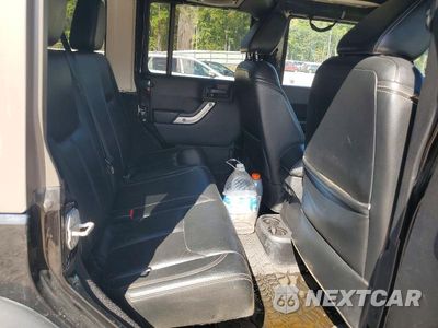 Zdjęcie 11 z 13 samochodu: 2014 JEEP WRANGLER UNLIMITED RUBICON VIN:1C4HJWFG1EL220681 - miniatura