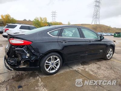 Trzecie zdjęcie samochodu z tyłu: 2016 FORD FUSION TITANIUM PHEV VIN:3FA6P0SU3GR121627 - miniatura