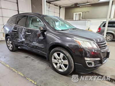 Czwarte zdjęcie samochodu z boku: 2017 CHEVROLET TRAVERSE PREMIER VIN:1GNKVJKD6HJ175804 - miniatura
