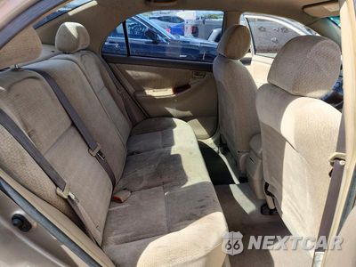 Zdjęcie 10 z 12 samochodu: 2004 TOYOTA COROLLA LE VIN:1NXBR32E24Z250701 - miniatura