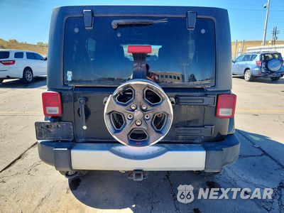 Zdjęcie 6 z 14 samochodu: 2014 JEEP WRANGLER UNLIMITED SAHARA VIN:1C4BJWEG4EL247719 - miniatura
