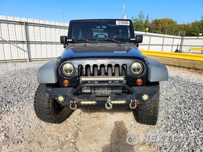 Piąte zdjęcie samochodu w środku: 2011 JEEP WRANGLER UNLIMITED SPORT VIN:1J4HA3H17BL597206 - miniatura