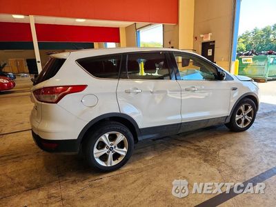 Trzecie zdjęcie samochodu z tyłu: 2014 FORD ESCAPE SE VIN:1FMCU9GX7EUD51671 - miniatura